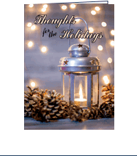 Image of front of Comfort Card: Holiday with picture of a silver lantern with a lit candle surrounded by pine cones and lights with the text: Thoughts for the Holidays